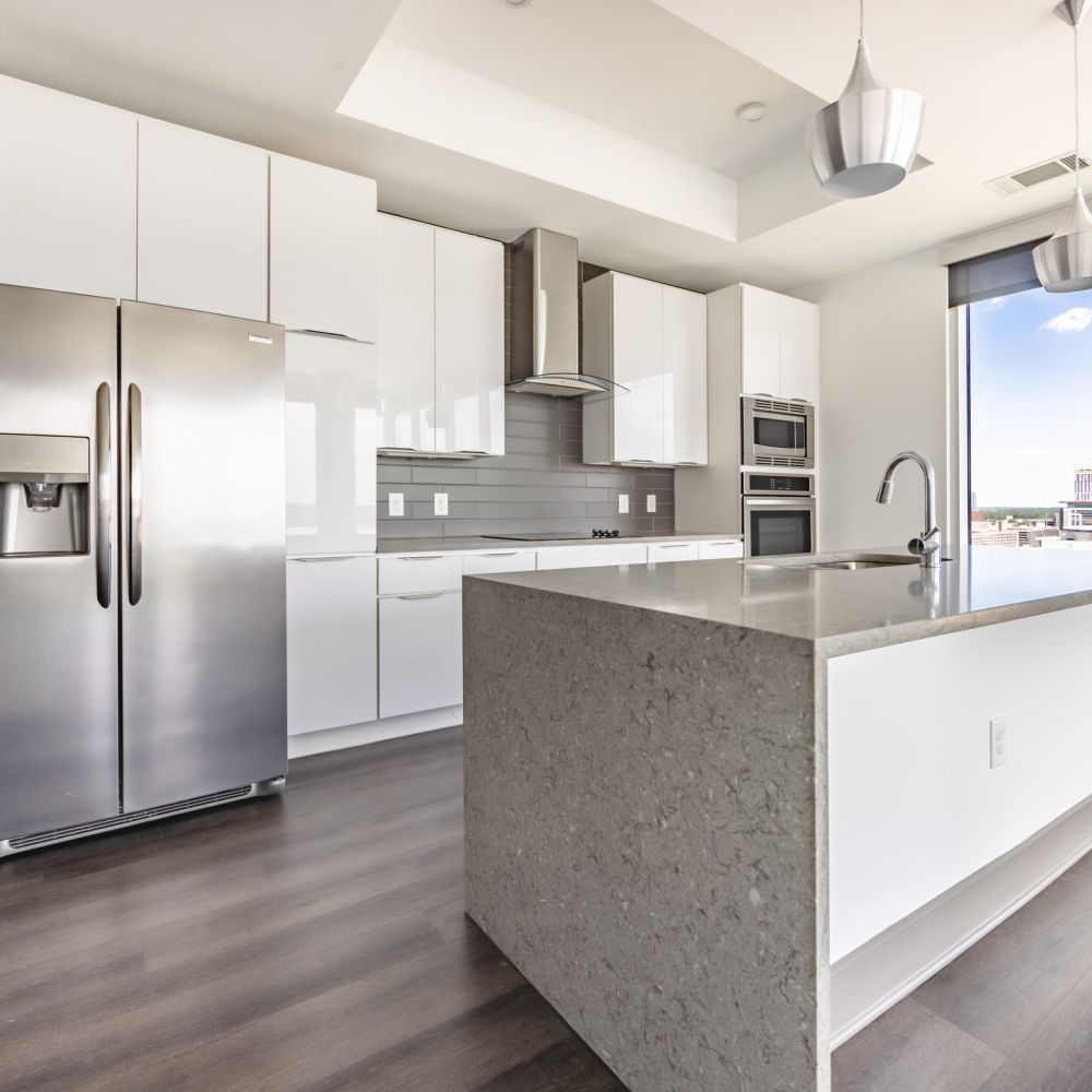 Uptown 550 Tower spacious penthouse kitchen with waterfall island