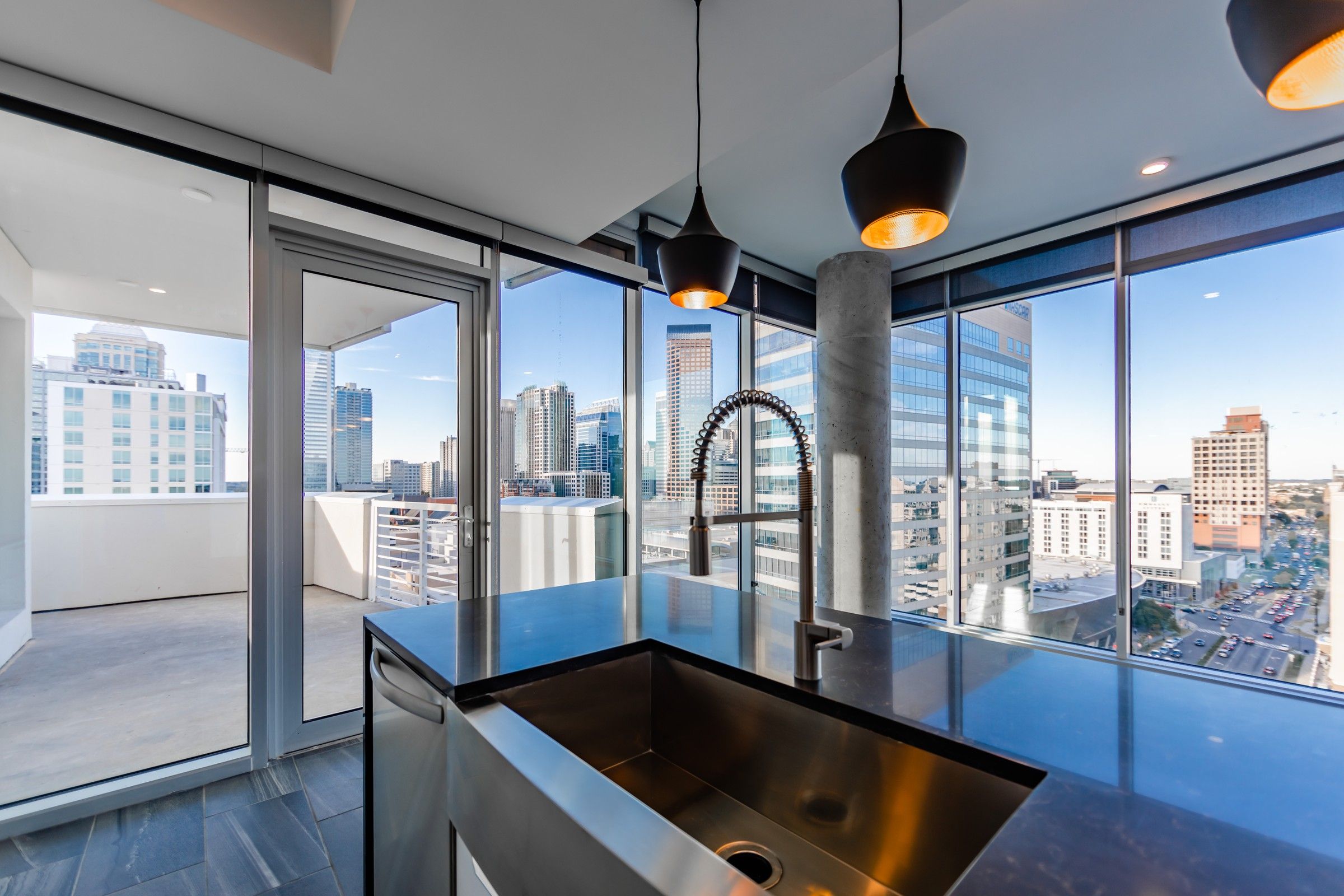 Uptown 550 The Tower penthouse minimalist modern kitchen with panoramic views