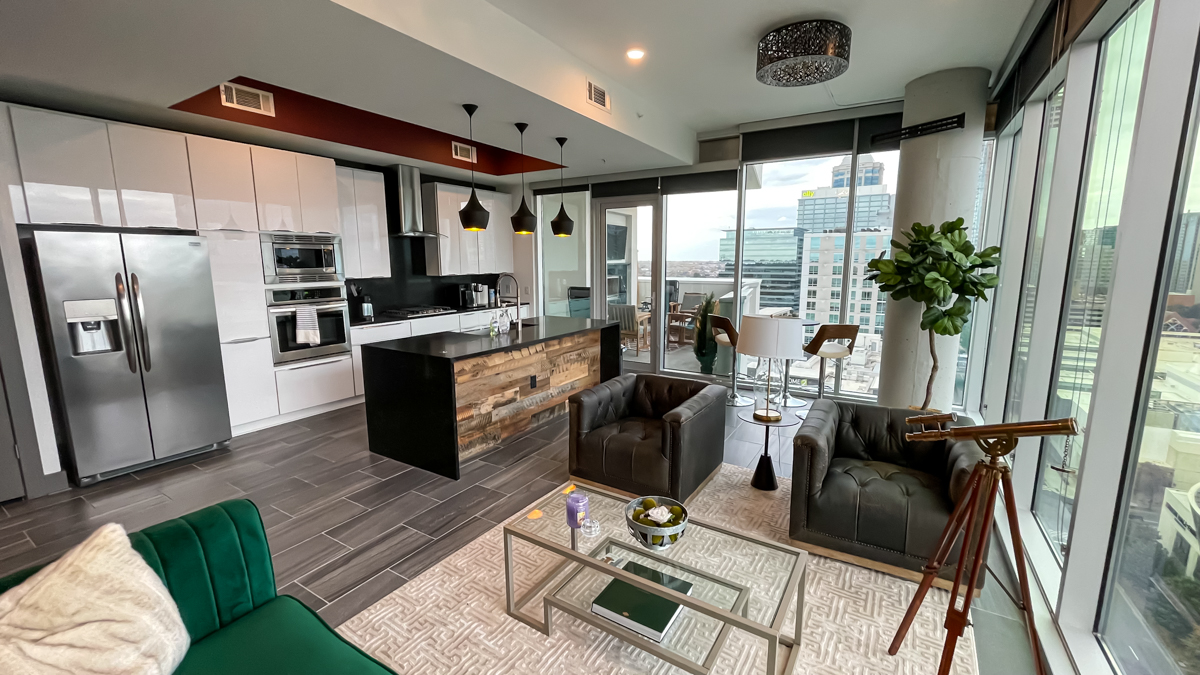 Uptown 550 on Brooklyn Tower penthouse furnished living room with panoramic views