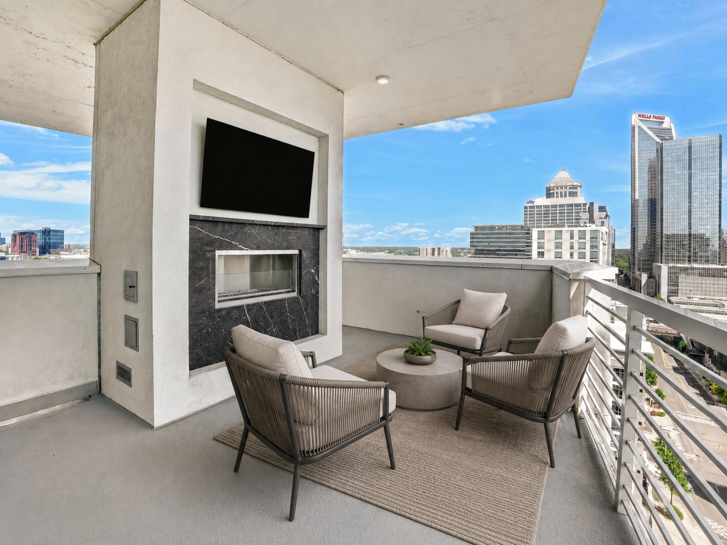 Uptown 550 Tower balcony with fireplace and panoramic views