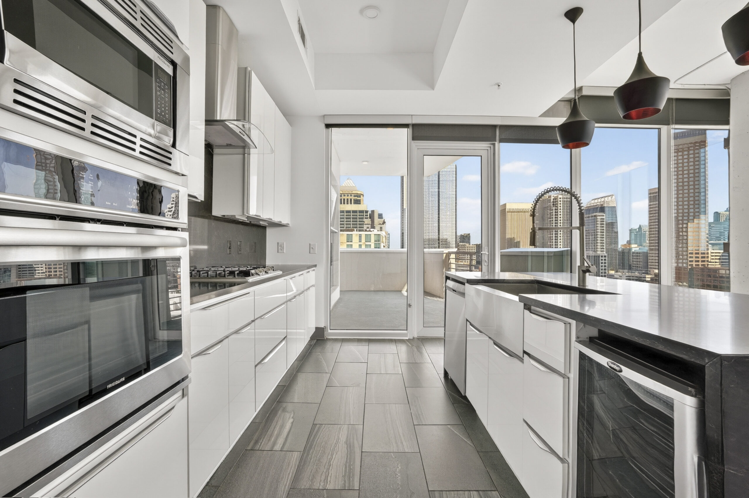 Uptown 550 The Tower penthouse minimalist modern kitchen with panoramic views